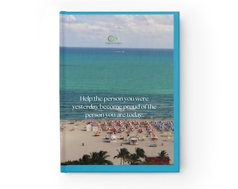 May include: A journal with a turquoise cover featuring a beach scene with a turquoise ocean and white sand. The journal has the text "Help the person you were yesterday become proud of the person you are today."