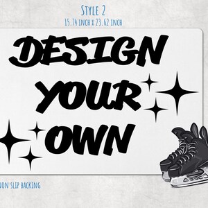 May include: A rectangular white mat featuring the black text DESIGN YOUR OWN, four black four-pointed star icons, and a black ice skate illustration. The mat measures 15.74 inches by 23.62 inches and includes a black non-slip backing.