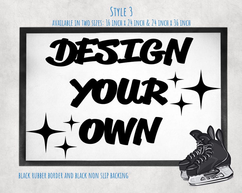 May include: A rectangular white mat with a black border, black non-slip backing, and the black text DESIGN YOUR OWN. The mat features black star icons and a graphic of black ice skates. Text indicates availability in 16 inch x 24 inch and 24 inch x 36 inch.