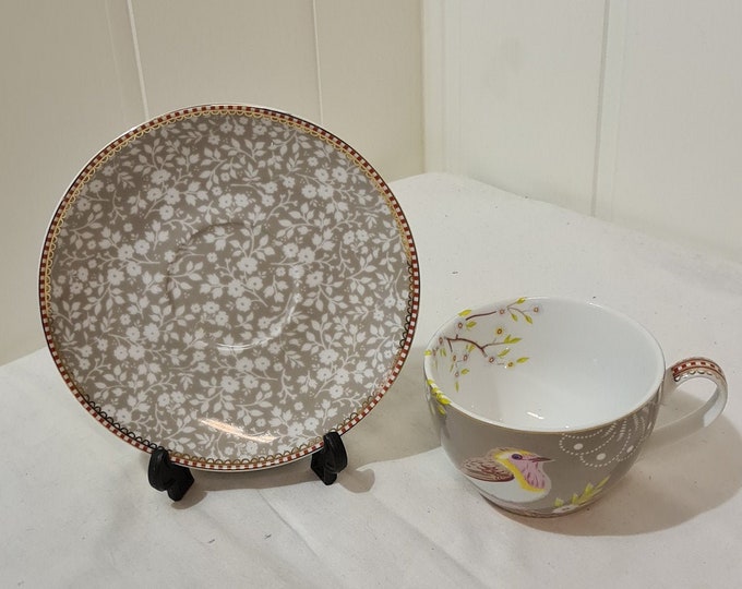 Charming cup and saucer with birds motif, Norwegian produced