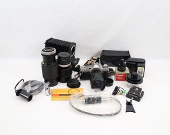 Canon AV-1 35mm Film Camera Set | 1970s Canon SLR with Lenses Macro Bellows Flash | Large Vintage Canon Kit