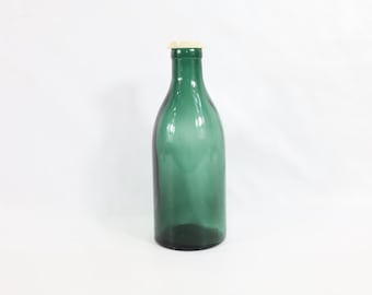 Vintage Noorse melkfles uit de jaren 1920 | Donkergroen glas | Collectorsitem | Antiek decor | Authentiek erfgoed