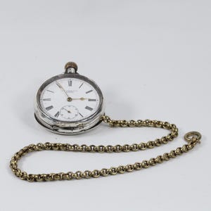 Turn Heads with Vintage Style: Timeless Beauty OMEGA Pocket Watch - Swiss Made Dress Clock with Chain