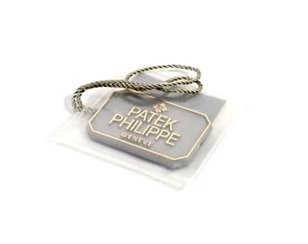 Patek Philippe Nautilus Hand Tag Ref 4700/3 | 1980s Original Tag in Plastic Pocket | Rare Vintage Collector Accessory | Prestige Item