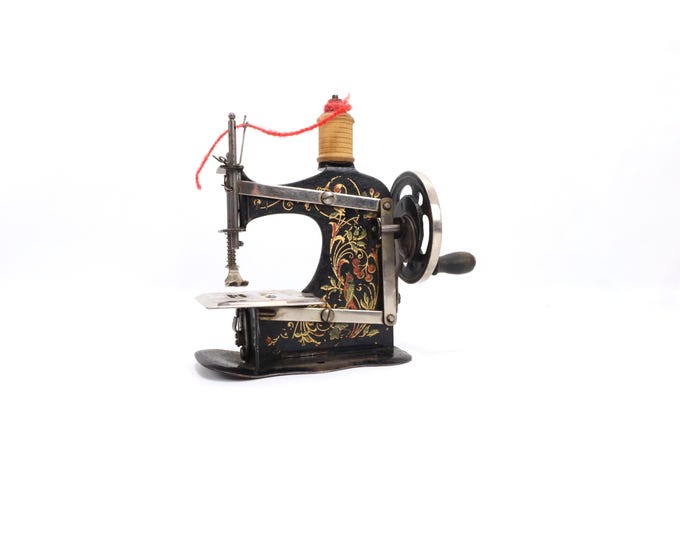 Antique Miniature Hand Crank Sewing Machine Child Model German Pressed Steel Floral Decor ca 1900