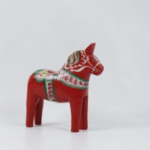 Handcrafted red Dala Horse from Dalarna, Sweden - Traditional and Original Swedish Folk Art