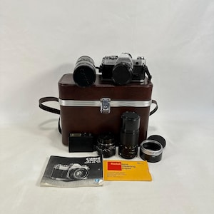 Vintage Canon AT-1 35mm SLR Camera Set with 4 Lenses and Flash - Perfect Gift for Camera Enthusiasts