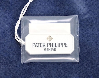 Patek Philippe Ellipse Hand Tag Ref 4826 | 1990s Original Tag in Plastic Pocket | Vintage Collector Accessory | Rare Patek Item