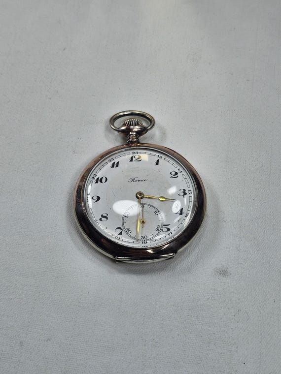 Vintage Elegance Timeless Beauty Antique revue Pocket Watch from Switzerland Exquisite Swiss design in Silver and Gold