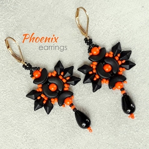 May include: Black and orange beaded earrings with a geometric design. The earrings are labeled "Phoenix earrings".