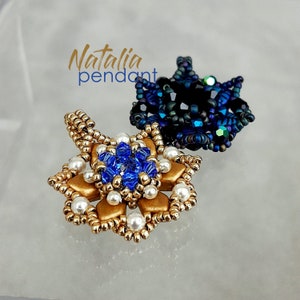 May include: Two beaded flower pendants, one gold with blue and white beads, the other black with blue and green beads. The gold pendant has the text "Natalia pendant" above it.