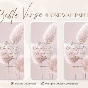 May include: Three phone wallpapers with a pink background and a quote from Ephesians 3:17, "Have the Christ dwell in your hearts with love!" The quote is written in gold script and is surrounded by dried pampas grass.