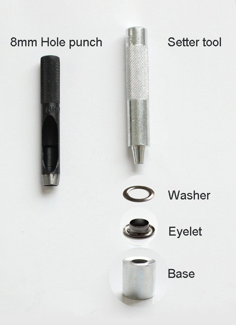 May include: A set of tools for installing eyelets, including an 8mm hole punch, a setter tool, a washer, an eyelet, and a base. The tools are silver and black.