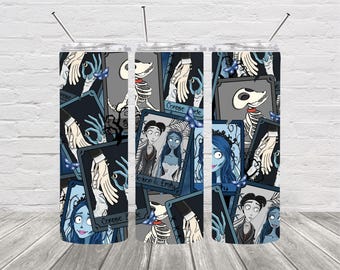 May include: A cylindrical stainless steel tumbler featuring a repeating pattern of characters and scenes from the movie Corpse Bride, including Victor, Emily, and Scraps the skeleton dog, with blue butterflies, hands holding rings, and text labels.