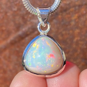 SOLD - RESERVED for JH Natural Ethiopian Welo Opal pendant in 925 sterling silver - handmade 16x27mm pendant - multi coloured gemstone