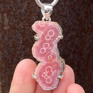 Argentinian Rhodochrosite Stalactite slice pendant in 925 Sterling Silver - handmade 23x57mm claw set pendant - natural pink gemstone