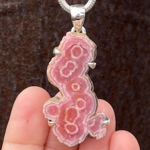 Argentinian Rhodochrosite Stalactite slice pendant in 925 Sterling Silver - handmade 25x55mm claw set pendant - natural pink gemstone