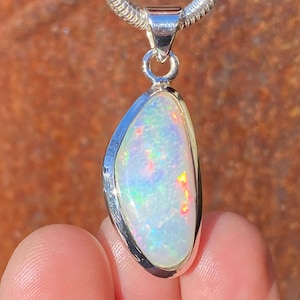 Natural Ethiopian Welo Opal pendant in 925 sterling silver - handmade 14x37mm pendant - multi coloured gemstone