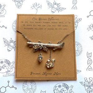 Oak branch with cute squirrel and acorn charms on card with a personalised Message