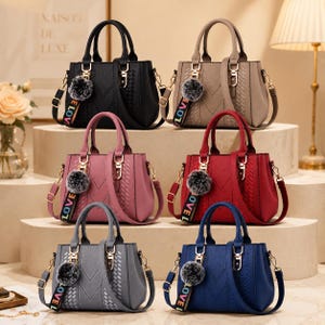 Torebka typu listonoszka ze sztucznej skóry, usztywniony uchwyt u góry, torebka typu crossbody z zawieszką