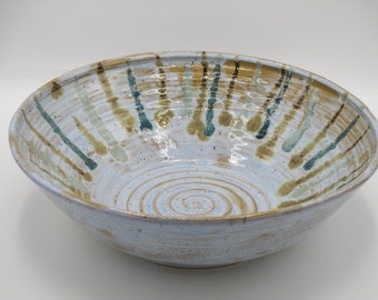Light Blue Bowl with Vertical and Curvy Swirl Line Accents