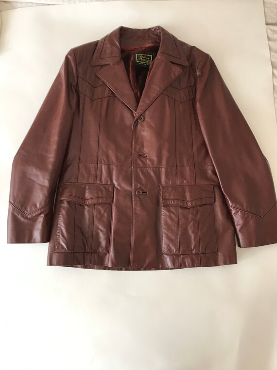 Coat: brown leather blazer, probably from the 70s;