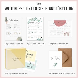 May include: A set of baby milestone cards with a light yellow background and green and white illustrations. The cards feature the text "Hallo Welti" and "Das hab ich". The cards are part of a set of 52 cards.