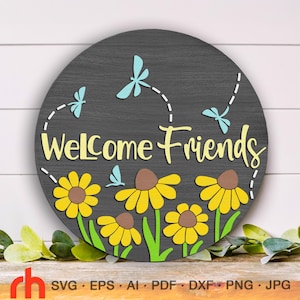 Willkommen Freunde SVG, Türschild Schnittdatei, Silhouetten von Wildblumen und Libellen, floraler runder Aufhänger DXF, Blumenhänger