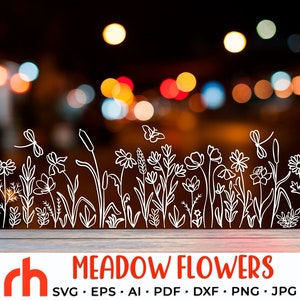 May include: A white outline drawing of a meadow full of flowers and plants. The drawing is on a dark background with blurry lights. The text "MEADOW FLOWERS" is below the drawing. The text "SVG, EPS, AI, PDF, DXF, PNG, JPG" is below the text "MEADOW FLOWERS".