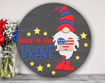 Home of the Brave SVG, Independence Day Door Sign Cut File, Silhouette of a Gnome with a Flag, Layered Patriotic Hanger, Summer Hanging Sign