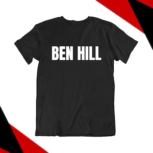 May include: Black t-shirt with white text that reads "BEN HILL".