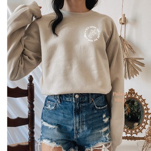 May include: A beige sweatshirt with a white graphic of a boba tea cup and the text "It's never too cold for boba tea".