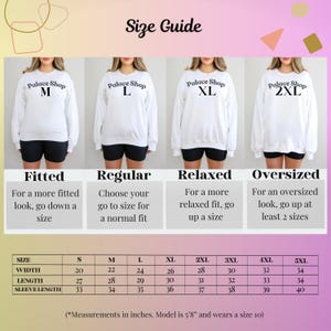 May include: Size guide chart for a sweatshirt with measurements in inches. The chart shows the width, length, and sleeve length for sizes S through 5XL. The chart also includes a description of the fit for each size: fitted, regular, relaxed, and oversized.