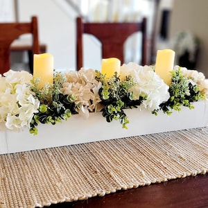 Floral centerpiece dining table neutral floral arrangement minimalist table decor candle lighting decor home decor hydrangea floral decor