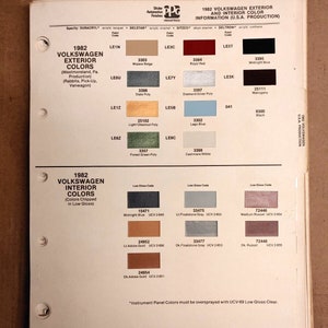 May include: A color chart for 1982 Volkswagen exterior and interior colors. The chart shows paint codes and names for colors like Mojave Beige, Royal Red, Midnight Blue, Slate Poly, Diamond Silver Poly, Light Chestnut Poly, Forest Green Poly, Lago Blue, Cashmere White, Mahogany, Black, Midnight Blue, LL Floatstone Gray, Medium Russet, Lt. Adobe Gold, Dk. Floatstone Gray, Dk. Adobe Gold, and Dk. Russet.