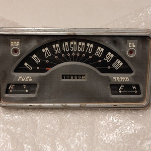 May include: A vintage car dashboard with a speedometer, fuel gauge, temperature gauge, and oil pressure gauge. The speedometer reads 116664. The fuel gauge is at half full. The temperature gauge is at the middle of the F and H markings. The oil pressure gauge has a red light that is on.