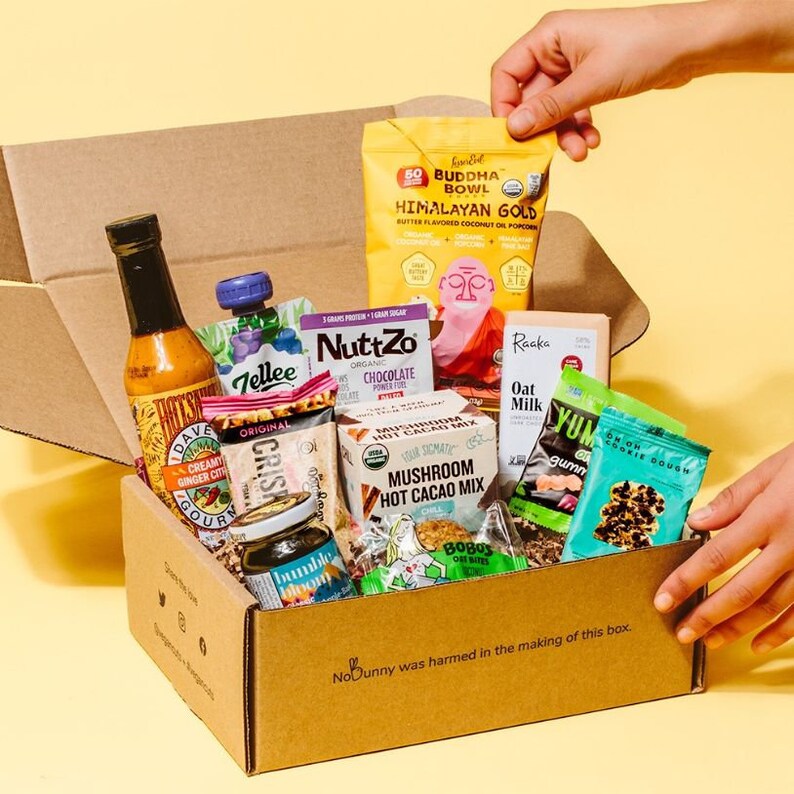18 College Care Packages for Guys That Will Instantly Light Up His Day 12 guys care package filled with 18+ Vegan Snacks and Drinks