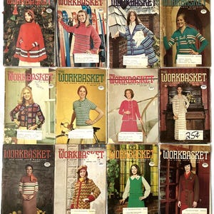 May include: A collection of vintage "Workbasket" magazines, each featuring a woman modeling knitted or crocheted clothing. The covers showcase various outfits in vibrant colors, including sweaters, dresses, and jackets. The magazines are from the 1970s.