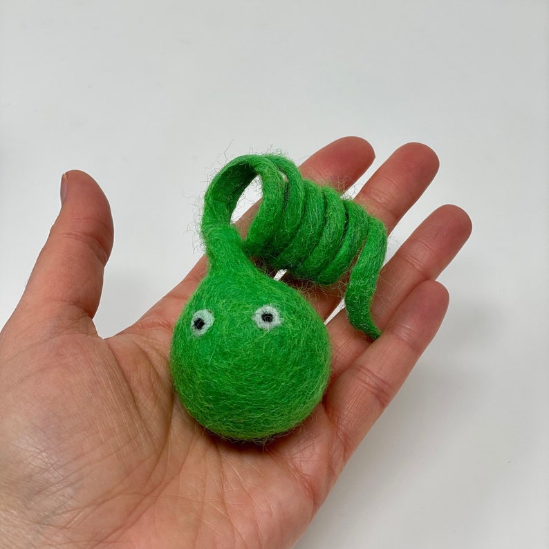 Green cat toy teaser