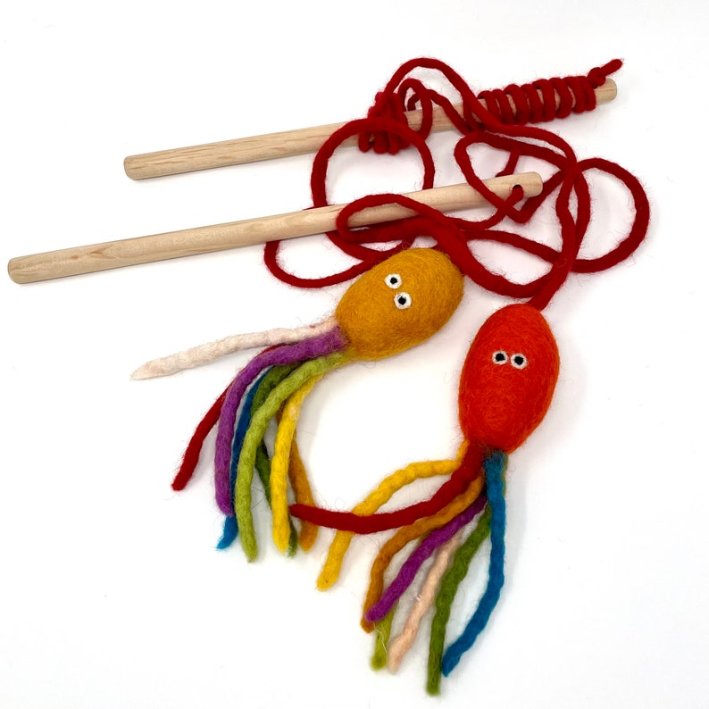 Cat toys, two cat wand toys in orange and red colors. Cat wool teaser toy.