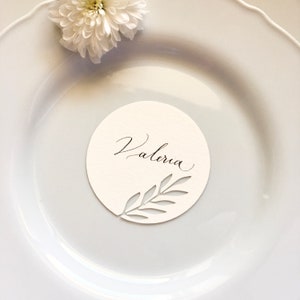 Marque Platz mit botanisches Motiv auf Papier mit Kalligraphie