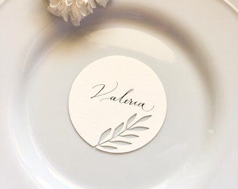 Merkplaats met botanisch motief op papier met kalligrafie
