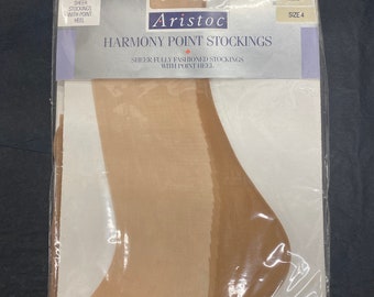 BRAND NEW - Aristoc Harmoney Point Sheer Stockings. Colour: Allure. Size 4 (10”)  (Shoe size 6)