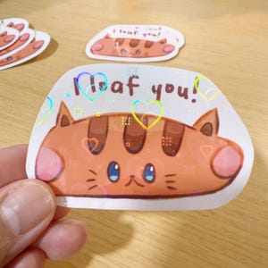 Erhalte 15% Rabatt auf 3 Sticker! [MIX AND MATCH] I Loaf You – Süßer Katzen Loaf Sticker mit Herz-Folie!