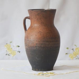 Rustic terracotta vase. Antique clay primitive vessel. Wabi sabi pottery indoor planter.