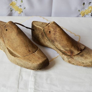 Antique wooden shoe mold or shoe form for rustic home decor or workshop decoration.Antique cobbler mold. Primitives antique folded shoe last
