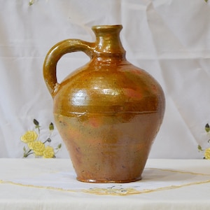 Wabi sabi pottery antique pitcher. Antique terracotta plant pot. Brown primitive clay vessel.