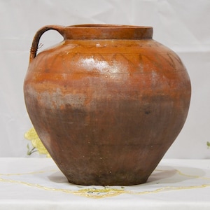 Large Brown primitive clay vessel. Wabi sabi pottery vase. Antique black ceramic pot.