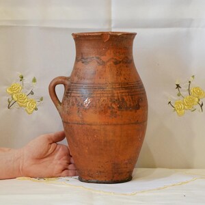 Rustic terracotta vase. Antique clay primitive vessel. Wabi sabi pottery indoor planter.