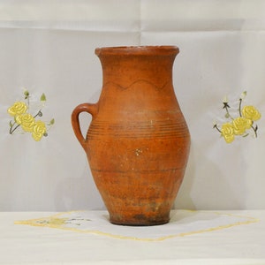 Rustic terracotta vase. Antique clay primitive vessel. Wabi sabi pottery indoor planter.